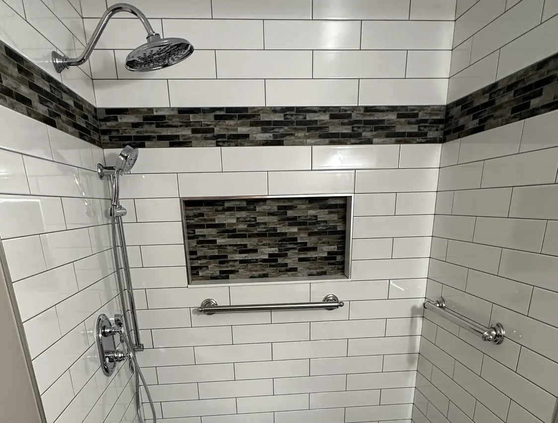 Professionally remodeled bathroom showcasing detailed tile work from Tile Brothers Company in Buffalo, NY